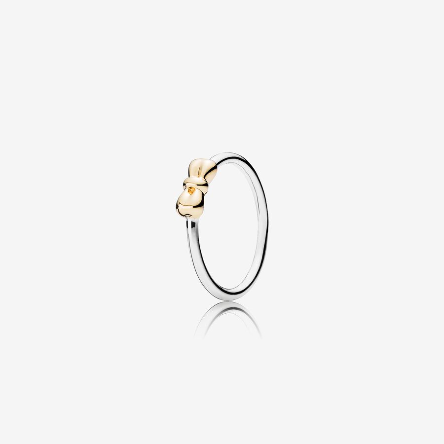 Silver ring with bow in 14k