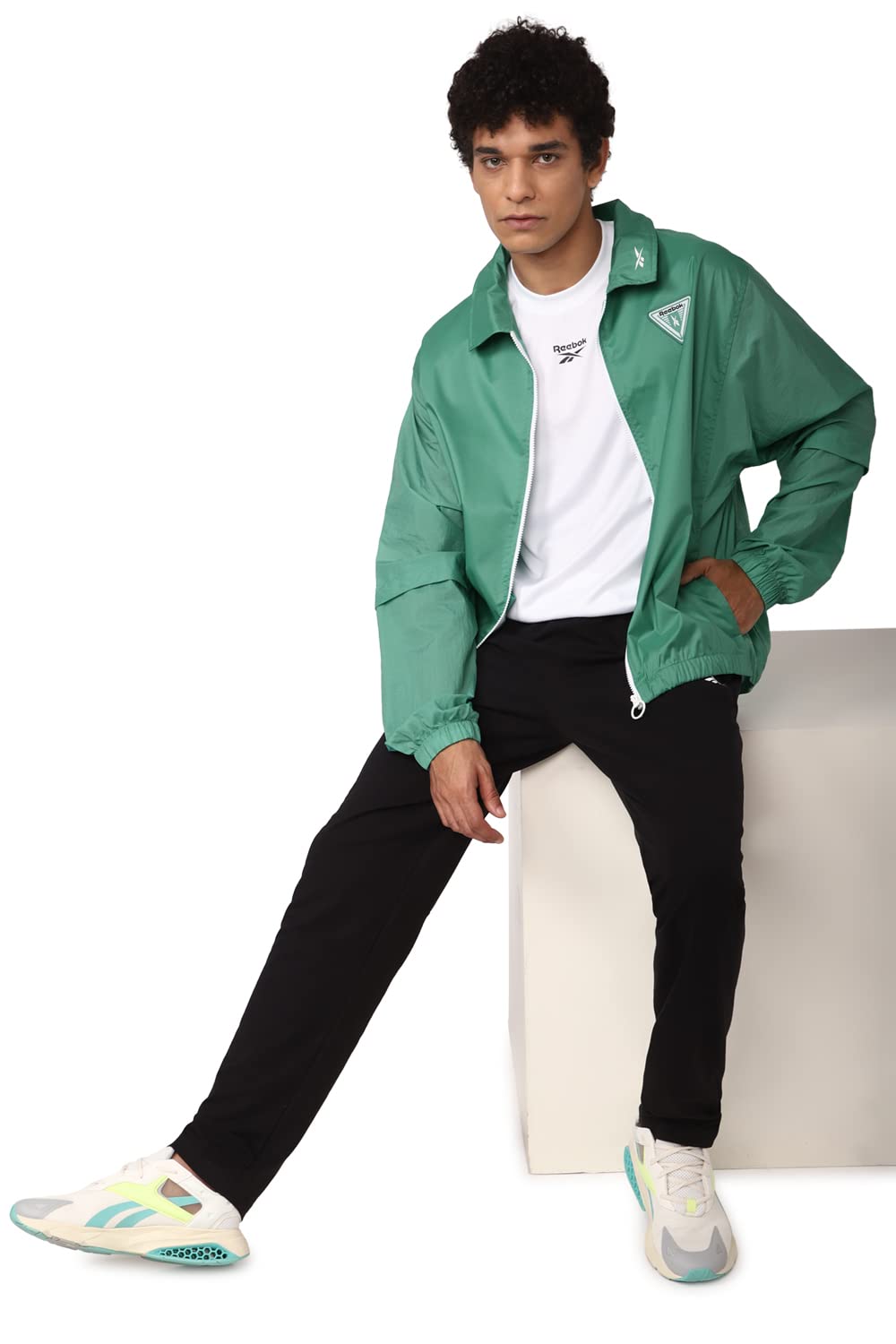 Reebok Men's MYT Woven Lightweight Jacket - Safqqa