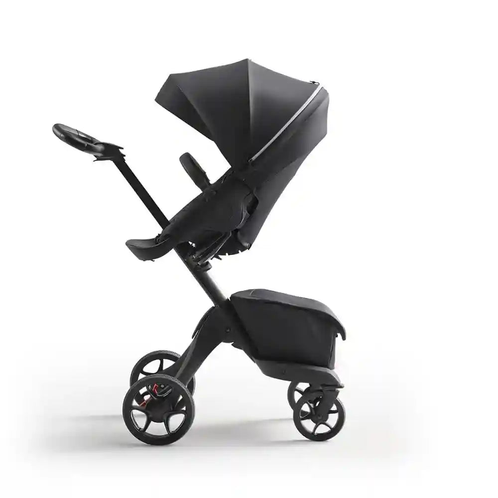 Stokke Luxury Baby Stroller - Adjustable for Both Baby & Parents’ Comfort - Padding, Harness & Reflective Zipper for Added Safety - Folds in One Step - Black