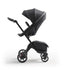 Stokke Luxury Baby Stroller - Adjustable for Both Baby & Parents’ Comfort - Padding, Harness & Reflective Zipper for Added Safety - Folds in One Step - Black