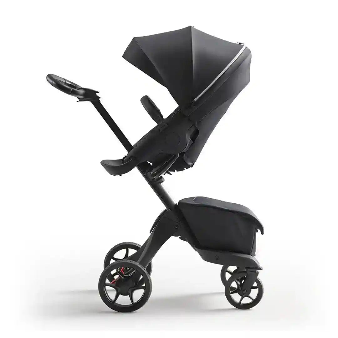 Stokke Luxury Baby Stroller - Adjustable for Both Baby & Parents’ Comfort - Padding, Harness & Reflective Zipper for Added Safety - Folds in One Step - Black