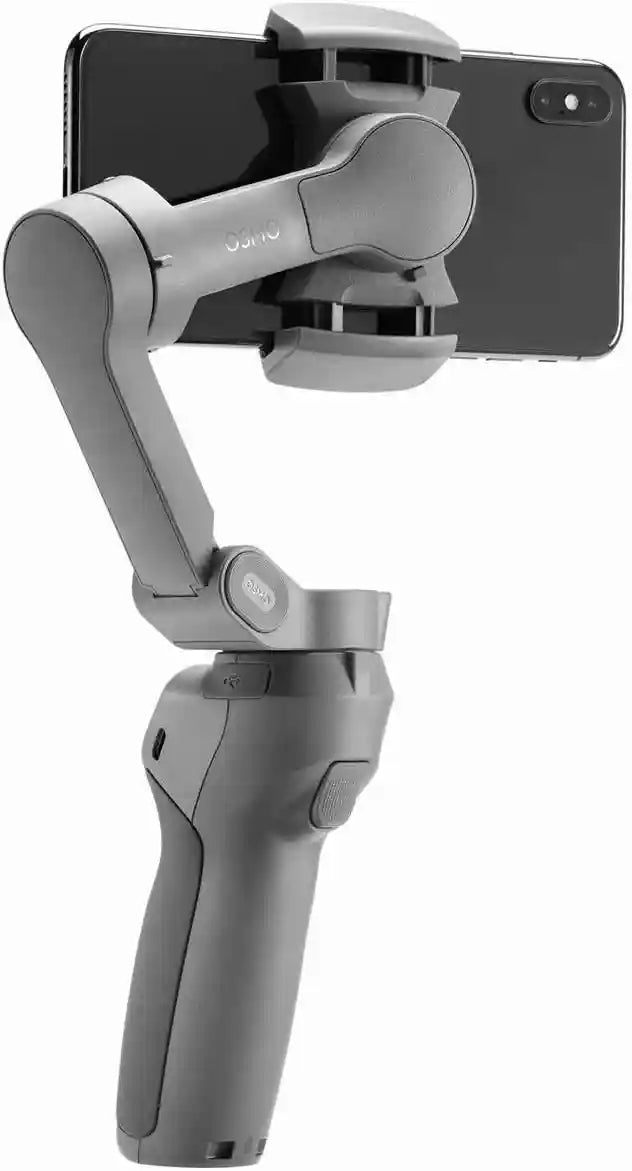 عدة DJI لتثبيت الهواتف باللون الرمادي هي أداة احترافية لتحسين تصوير الفيديو بالهاتف المحمول. توفر تصويرًا سلسًا ومستقرًا من خلال تعويض حركات اليد، مما يتيح تسجيل مقاطع فيديو بجودة سينمائية