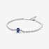 Sterling silver tennis bracelet with princess blue crystal and clear cubic zirconia