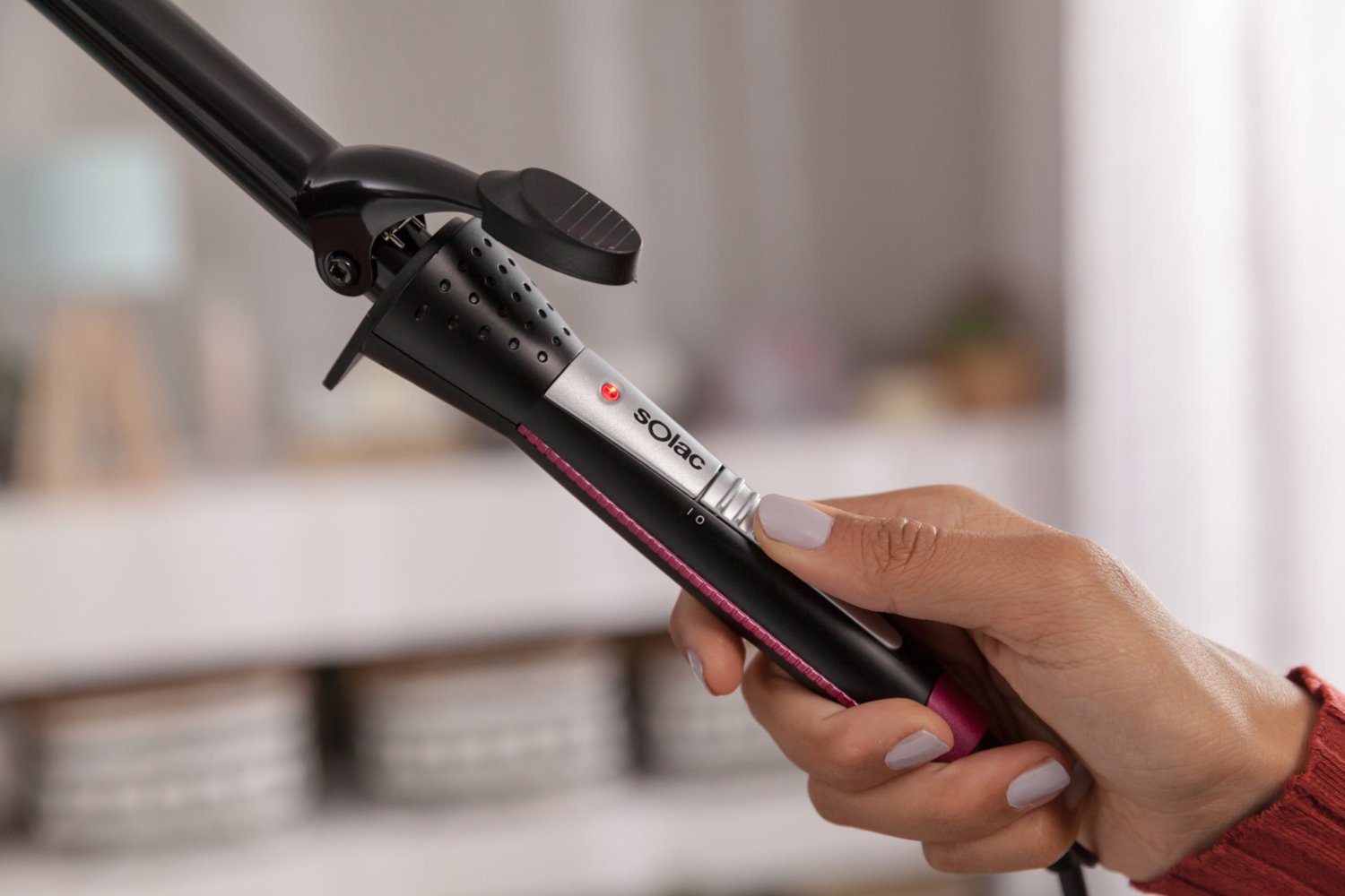 Curling solac iron.