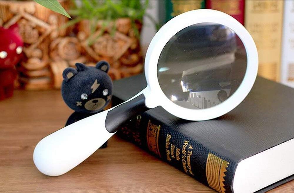 CAPXXIN 90mm Handheld Magnifying Glass HD Reading Lens White – Safqqa Egypt