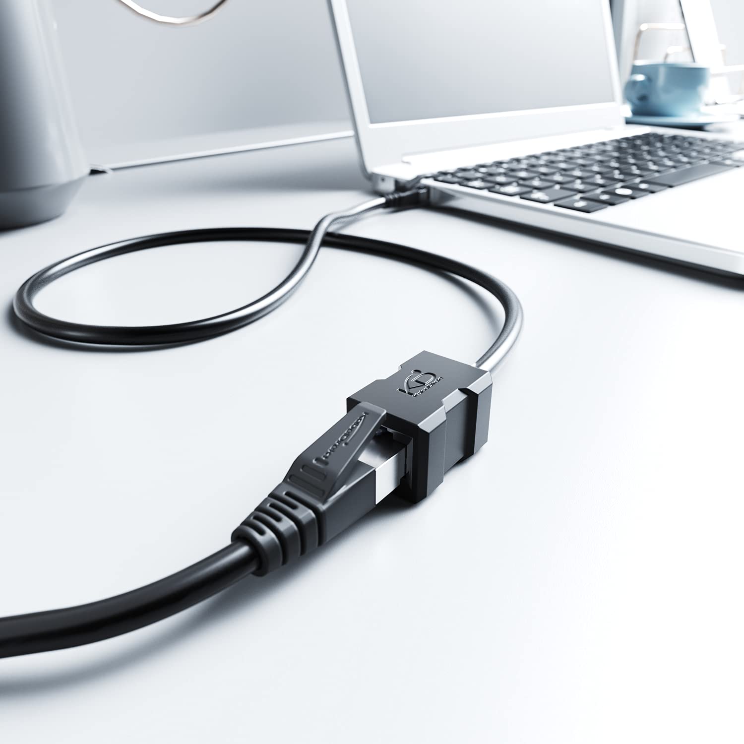 KabelDirekt â€“ 0.25m â€“ LAN & Ethernet extension cable (RJ45 female coupler/male connector, extends network cables with full data transfer speed â€“ CAT 7, 10Gbit/s, SF/FTP shielding, black)