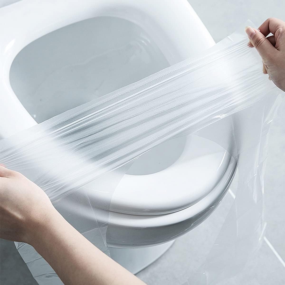مجموعة أغطية مقاعد تواليت للاستخدام مرة واحدة بتصميم محمول مضاد للماء مكونة من 50 قطعة من لاكيراو، مناسبة للسفر والأطفال والحوامل