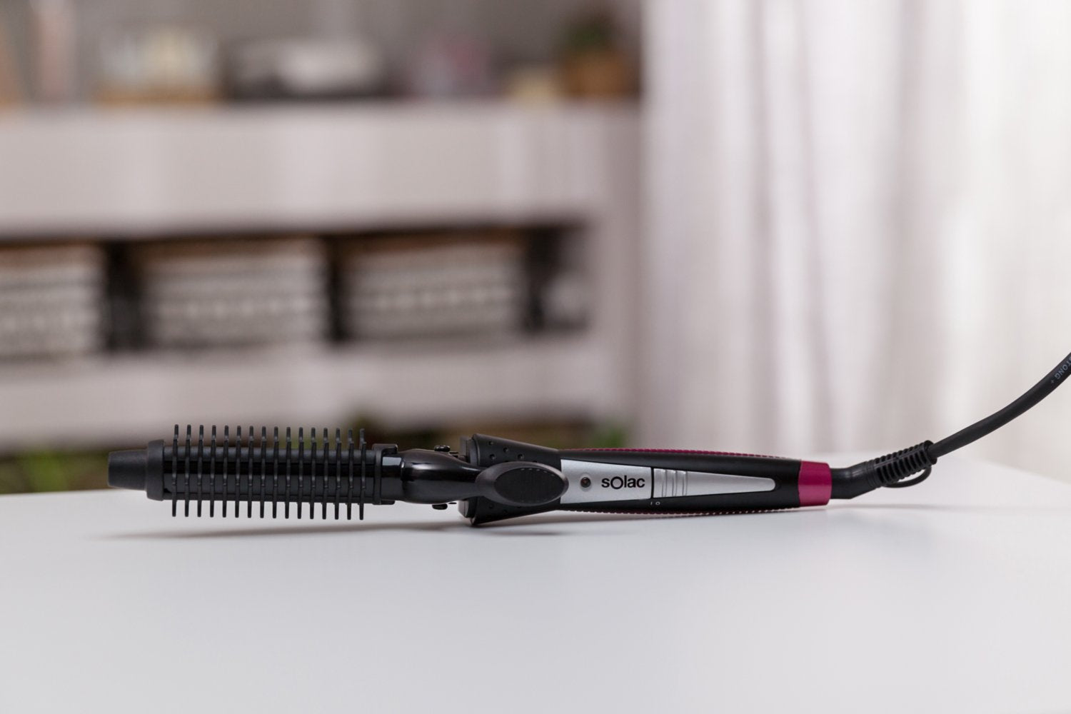 Curling solac iron.