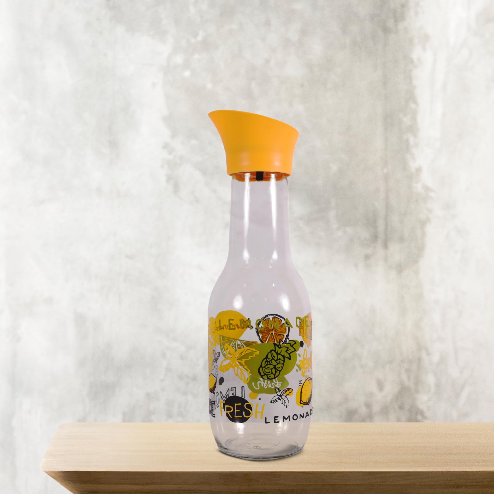 زجاجة مياه مزخرفة هيرفين بسعة 1 لتر هو حل أنيق وعملي لتقديم المشروبات. مصنوع من الزجاج عالي الجودة في تركيا