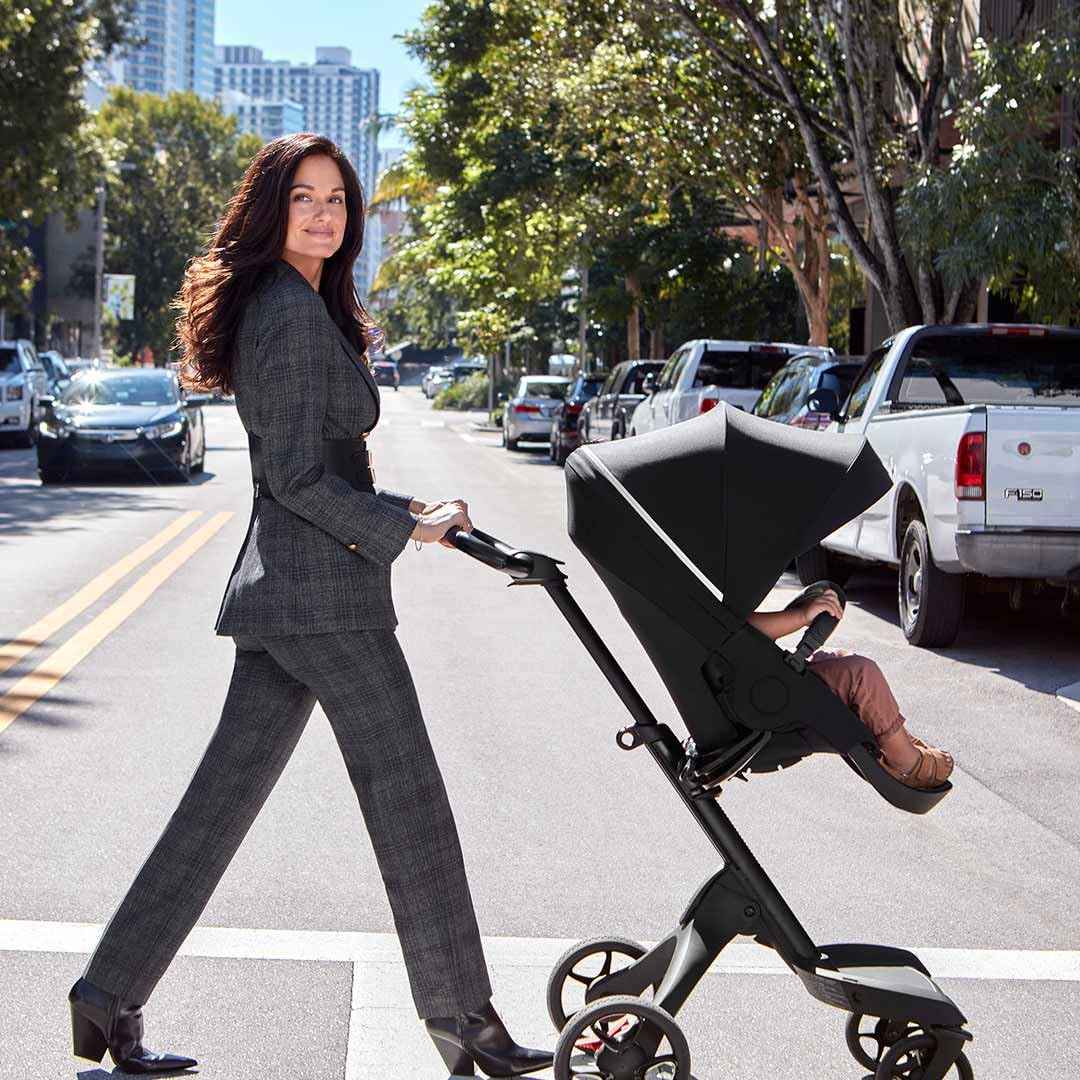 Stokke Luxury Baby Stroller - Adjustable for Both Baby & Parents’ Comfort - Padding, Harness & Reflective Zipper for Added Safety - Folds in One Step - Black