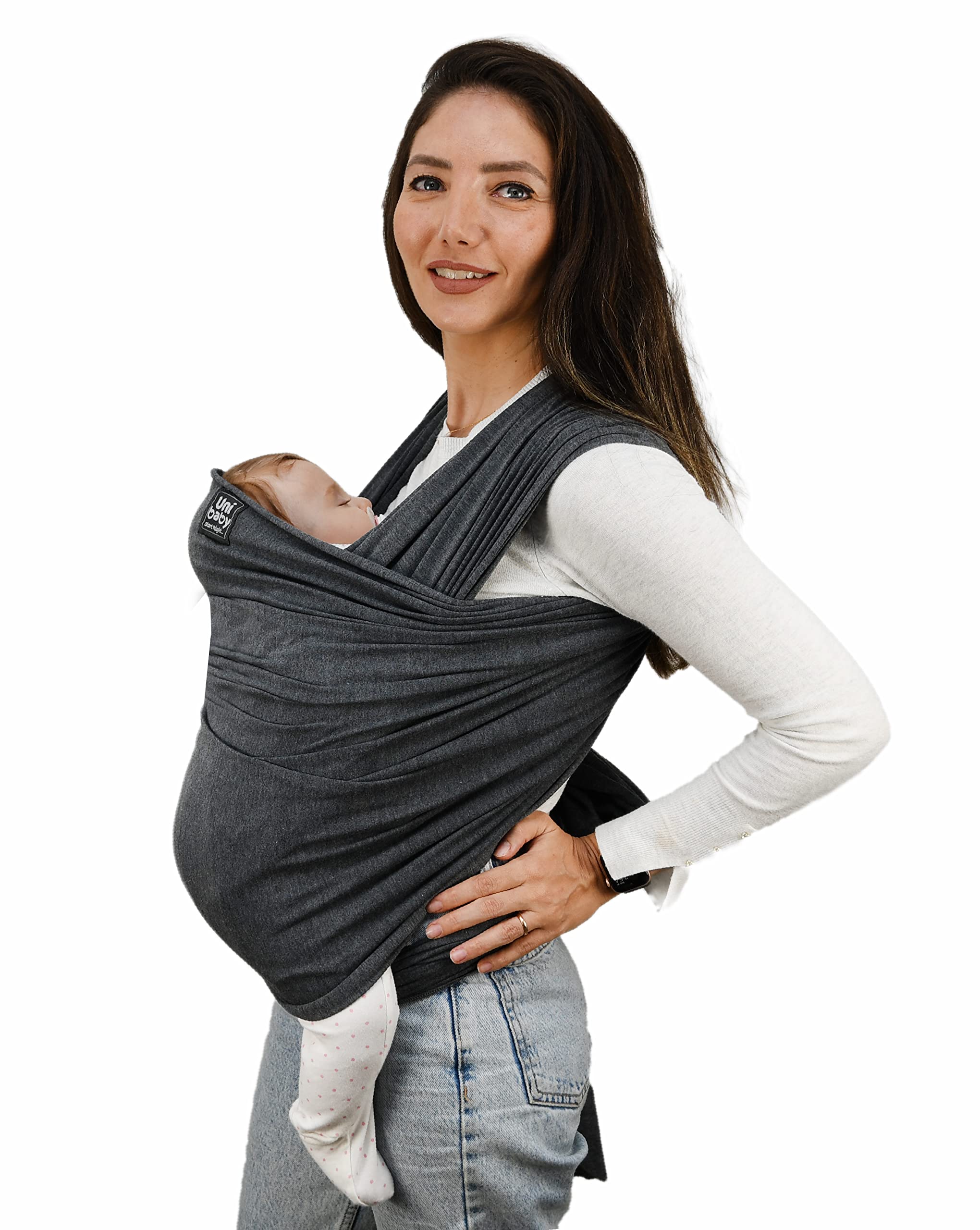 احملي طفلك براحة وأناقة مع حاملة الأطفال Petit Bebe Uni باللون الرمادي الأنيق. مصنوعة من قماش ناعم وقابل للتمدد والتنفس، توفر الحاملة دعمًا ممتازًا للأم والطفل مع حرية حركة اليدين