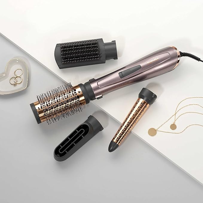 مجفف وتصفيف الشعر من  Babyliss ، و1000 واط، وضعان للحرارة + وضع هواء بارد، مع 4 ملحقات أداة متعددة الوظائف تساعدك على الحصول على تصفيف شعر احترافي في المنزل. 