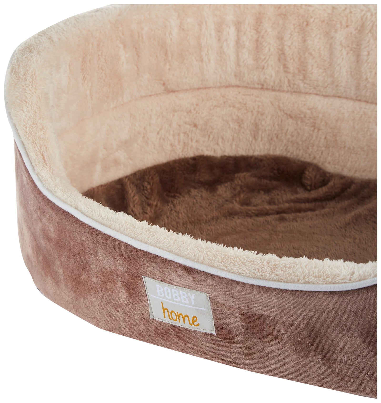 سلة للحيوانات الأليفة من بوبي أستريد باللون الرملي توفر مساحة مريحة للراحة للكلاب والقطط. يبلغ حجمها ٧٠ سم، مصنوعة من خامات ناعمة ومتينة لضمان شعور الحيوان بالراحة والأمان