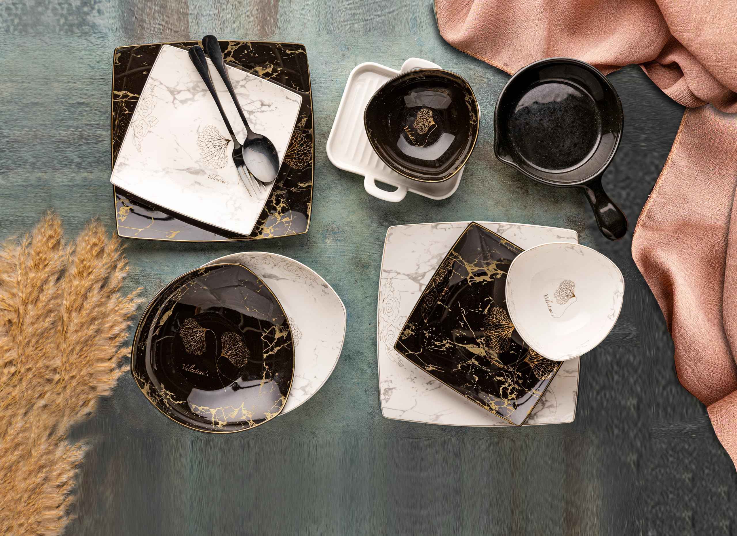 طقم عشاء Lotus مكون من 26 قطعة يوفر مجموعة كاملة وملونة لتقديم الطعام في منزلك. يشمل الطقم 6 أطباق فطائر، 6 أطباق كاتو، 6 أطباق شوربة، 6 أوعية عادية، مقلاة بورسلين دائرية واحدة، وشواية مربعة واحدة. 